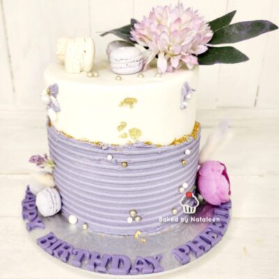Purple and White Cake With Macarons