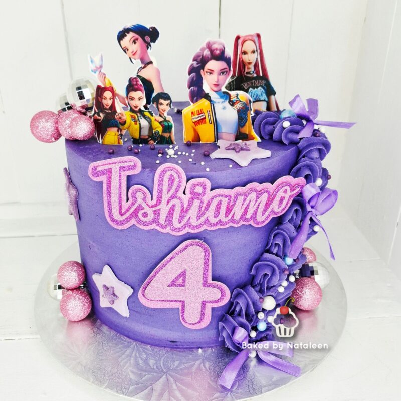 Purple birthday cake with pink number 4 and name in script, purple icing rosettes, and cartoon character toppers with pink glitter balls on the side. Watermark says 'Baked by Nataleen'.