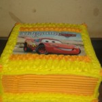 Square "Cars" theme cake with printed topper