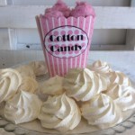 White fluffy meringues and pink cotton candy